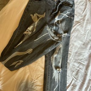 Black stretchy skull jeans